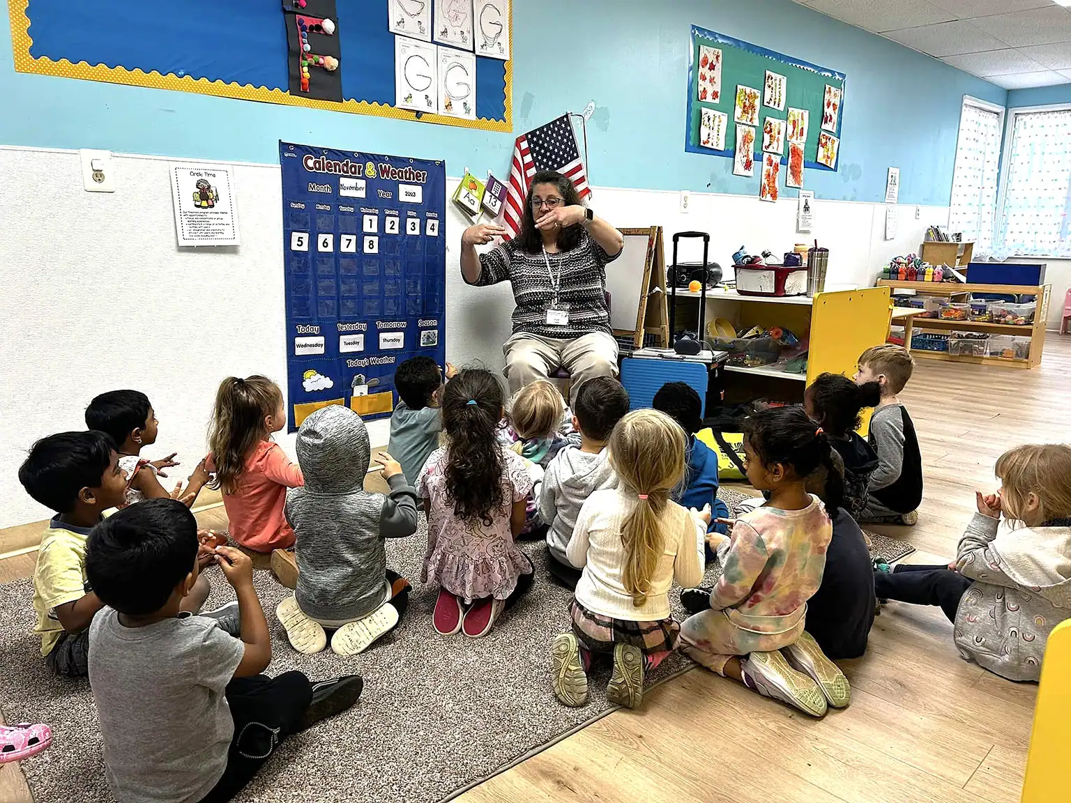 kids-body-image Youth Service librarian speaking to a group of young children
